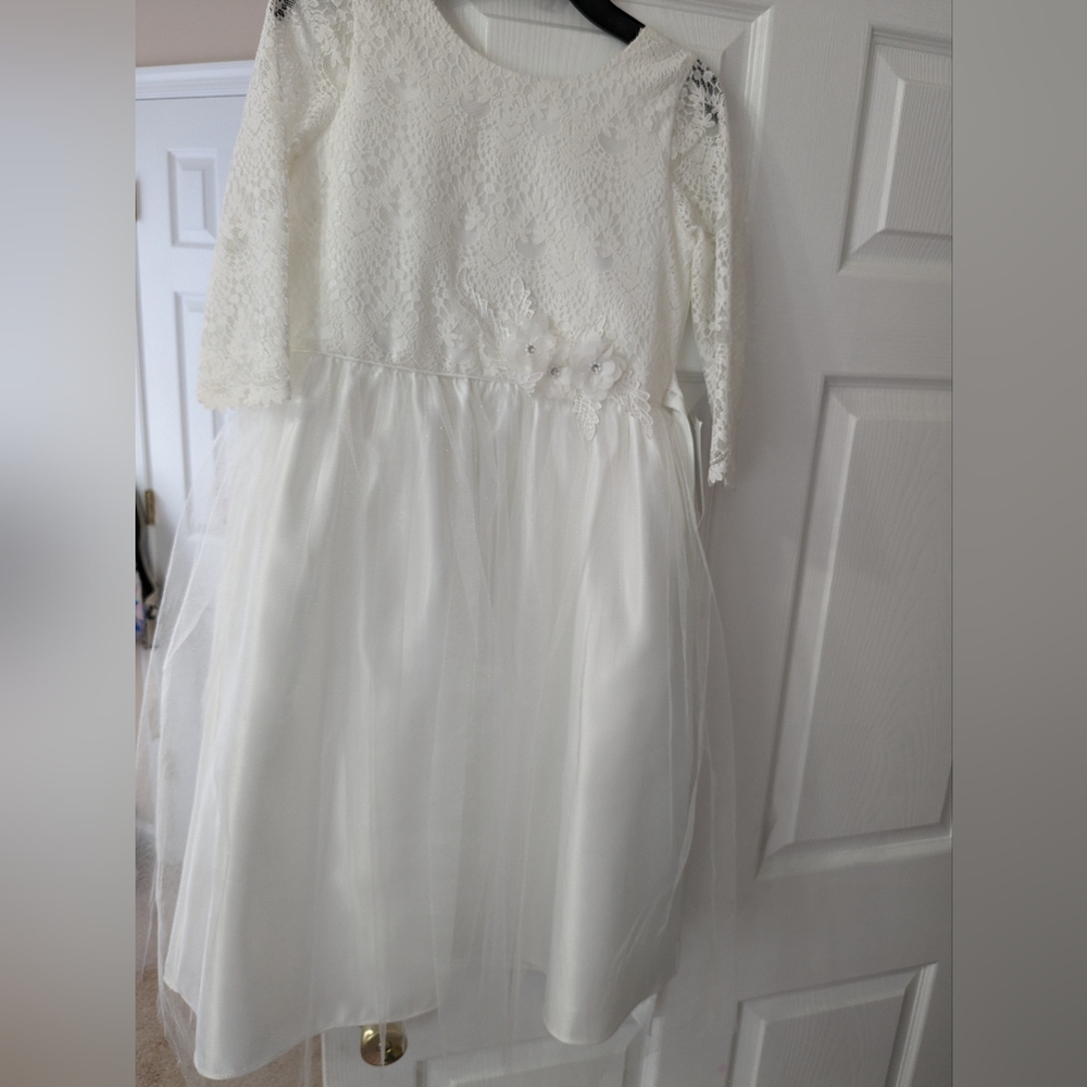 Sally dress. The color of this dress is more of an off white color. - Picture 4 of 4